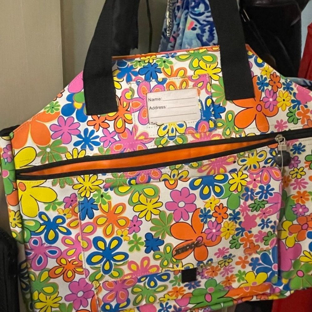 Jetpac Retro Floral Tennis bag. Tons of pockets and double shoulder strap.